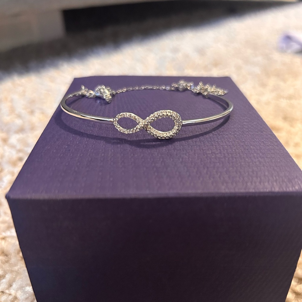 Swarovski infinity bracelet. Excellent condition. Brand new in box.